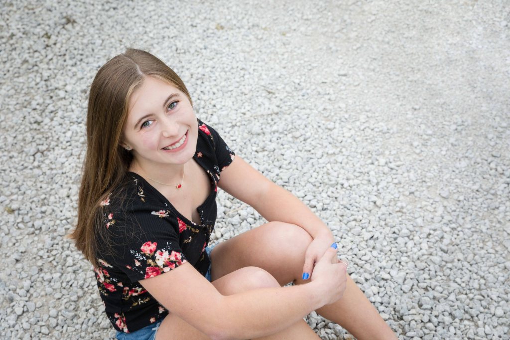 happy senior enjoying a photo session Blue Springs Missouri
