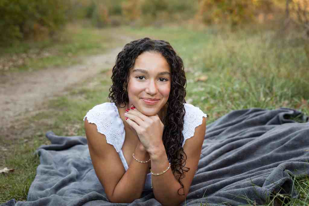 Natural posing during a senior photo session in Blue Springs Missouri