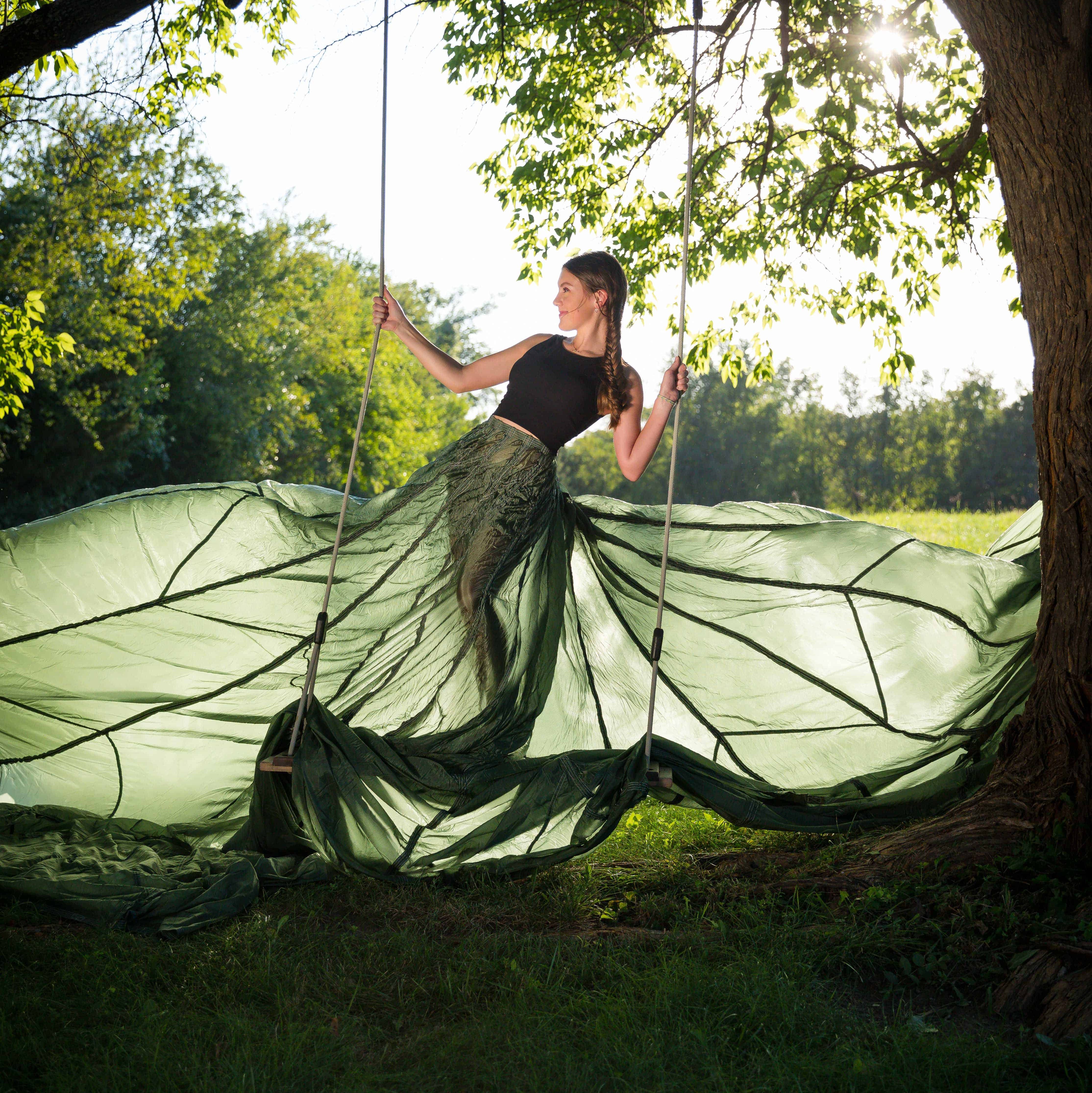 Parachute dress session with a tree swing