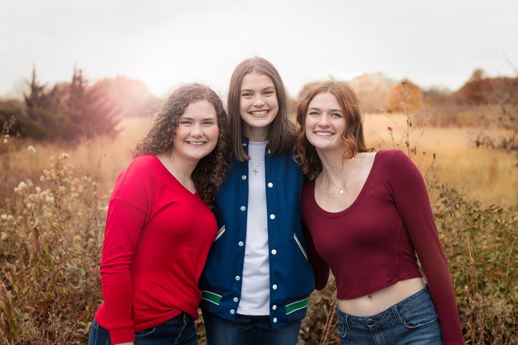 Blue Springs Senior Team members enjoying group photo session at Case Studios Photography