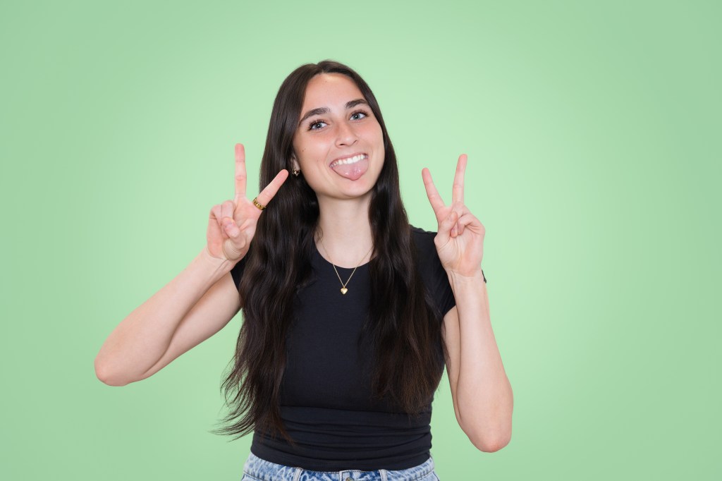 high school senior wearing timeless outfit for senior photos