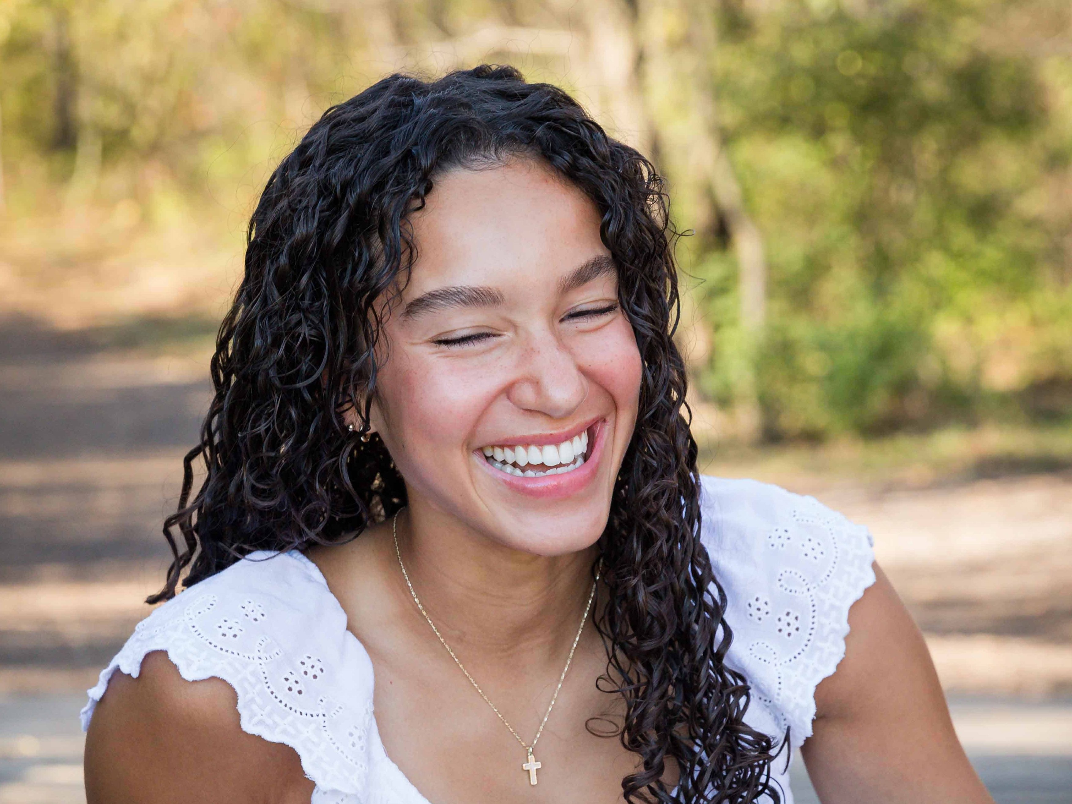 Natural senior portrait with genuine smile in Blue Springs, Missouri